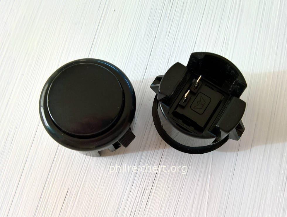 >Spare arcade buttons supplied