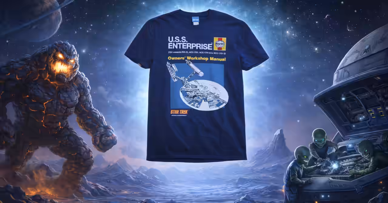 Illustrated alien moon scene with a glowing Star Trek Haynes Workshop Manual T-shirt centered, a rock monster on the left, and aliens repairing a starship on the right