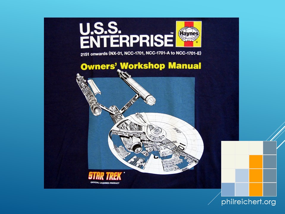 Close-up of the Haynes Owner’s Workshop Manual graphic on the Star Trek USS Enterprise T-shirt, focusing on the cutaway illustration and typography