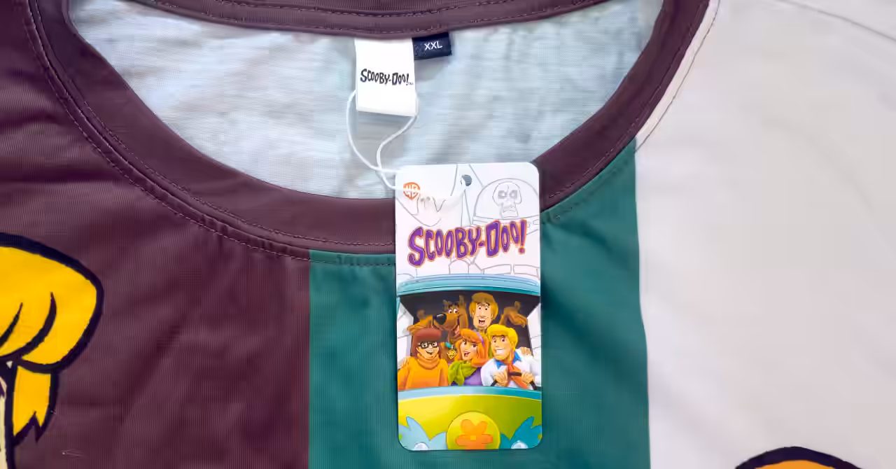 Scooby-Doo T-shirt presented as a card image with characters Shaggy, Scooby-Doo, and Daphne