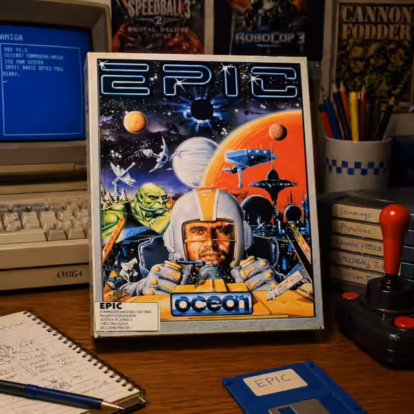 EPIC computer game box displayed on a 1992-style computer desk with an Amiga, floppy disk, joystick, and retro game posters