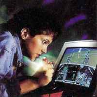 boy playing flight simulator game on the Amiga